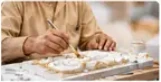 Artisan customizing a handcrafted marble idol